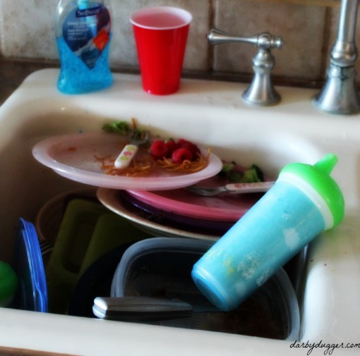 Dirty dishes in the sink.